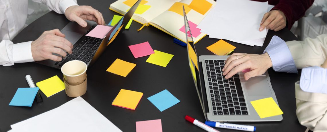 4 - high-angle-people-working-together